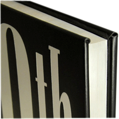 Closeup of a book edge-gilt in white foil